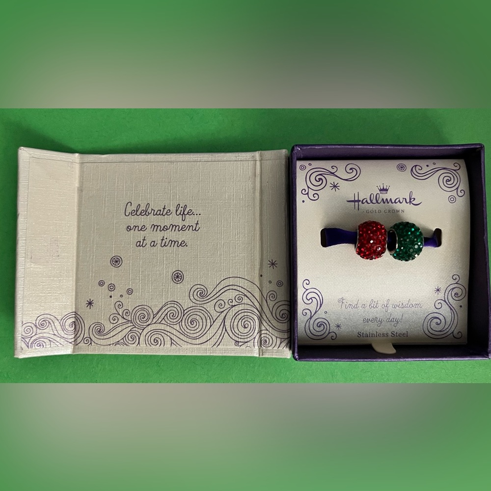 2 Hallmark Connections Charms one red and one green.